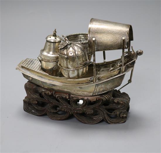 A Chinese white metal white metal junk condiment stand by Wang Hing, 11.8cm.
